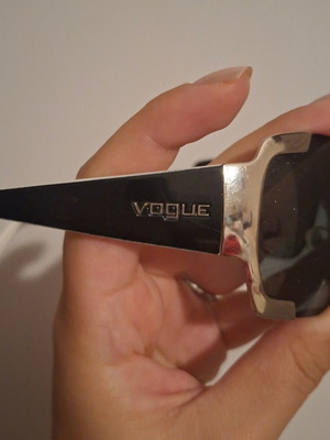 Vogue VO 3593-S sunglasses used, white frame with metal details