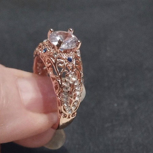 Elegance rose gold ring with white and blue stones