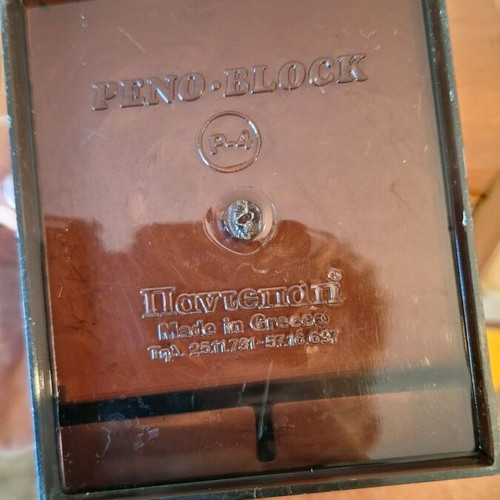 Olympic Airways pencil holder used with signs of wear and age