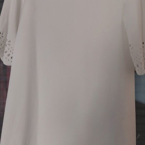 White women's dress with lace design, polyester, 3/4 sleeves, knee length