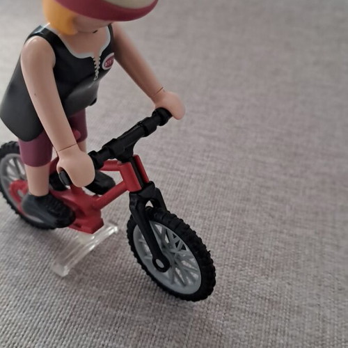 Playmobil woman with bicycle figure