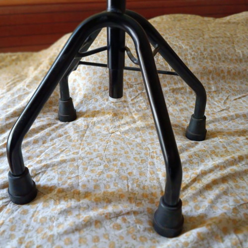 Walking cane with four-legged base used, adjustable height