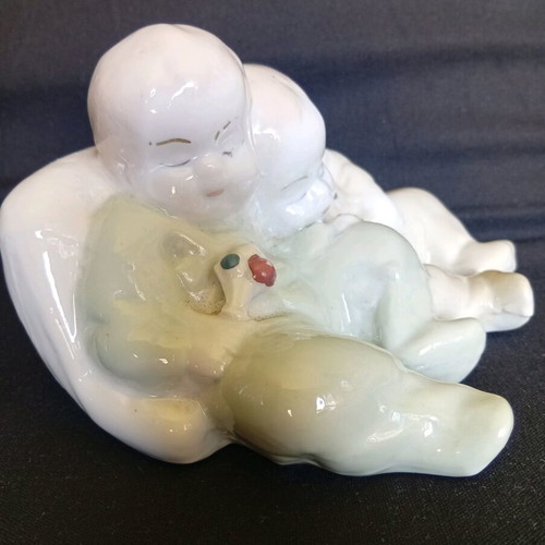 Porcelain figurine of twin babies like new