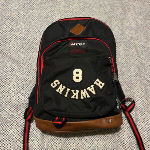 Eastpak Stranger Things backpack used, black with stain