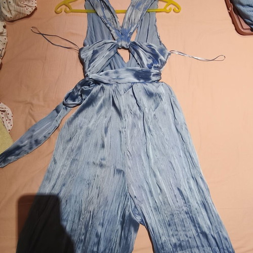 Zara jumpsuit new with pleated pants and unique back