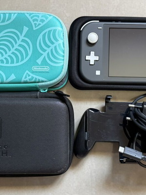 Nintendo Switch Lite γκρι σαν καινούργιο με φορτιστή, χειρολαβή και θήκη
