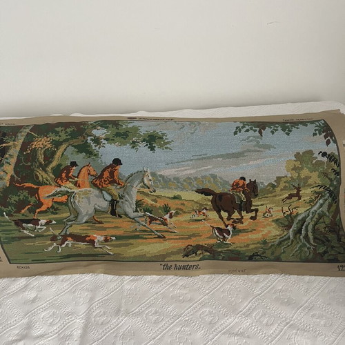 Handmade embroidered textile painting with classic hunting scene