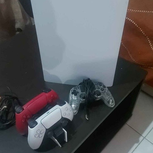 PlayStation 5 Digital Edition 1TB like new with charging base and extra wired controller