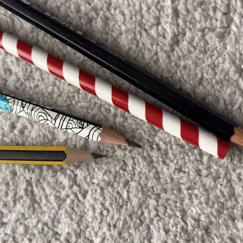 Pencils like new, set of 4 with various designs