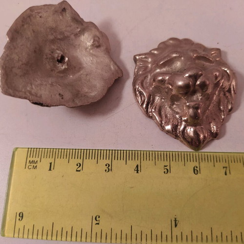 Bronze lion heads set of two like new