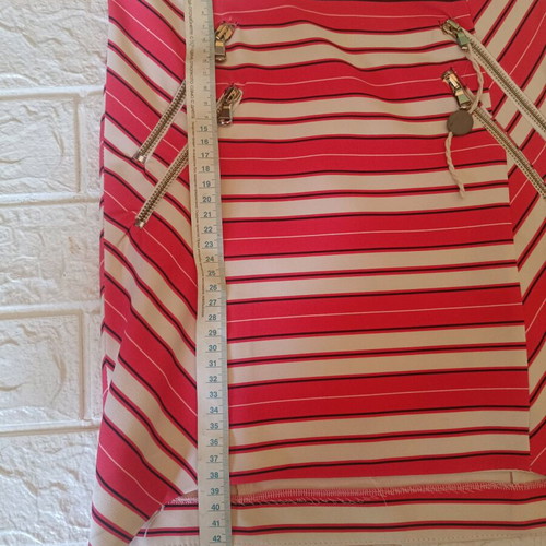 Relish skirt size 42 like new, orange with decorative zippers