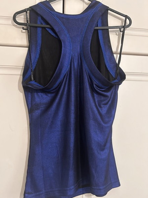 Guess top used, size S, blue with discoloration