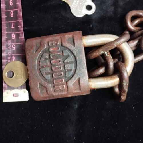 Padlock used with key, chain and skeleton key