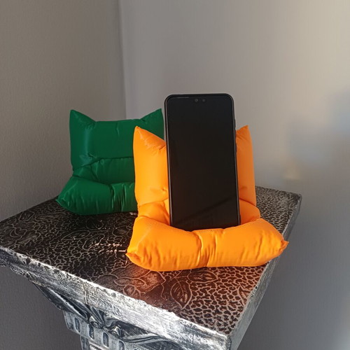 Phone holder 3D printed with charging space