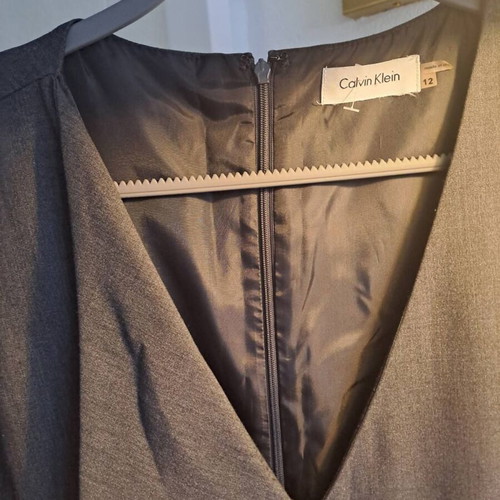 Calvin Klein dress gray size 12 like new with V-neck and ruffle