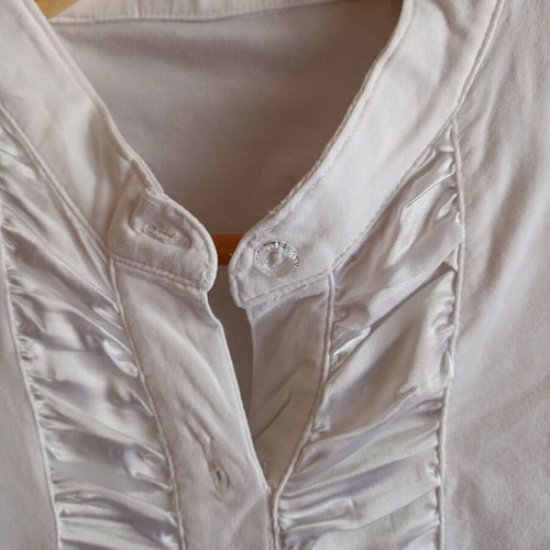White blouse with satin ruffles and decorative crystal buttons, like new
