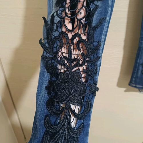 Jeans with black embroidery large like new