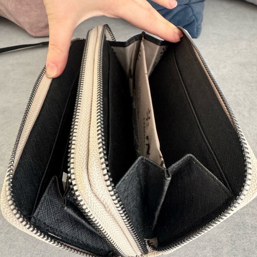 Beige wallet with designs like new