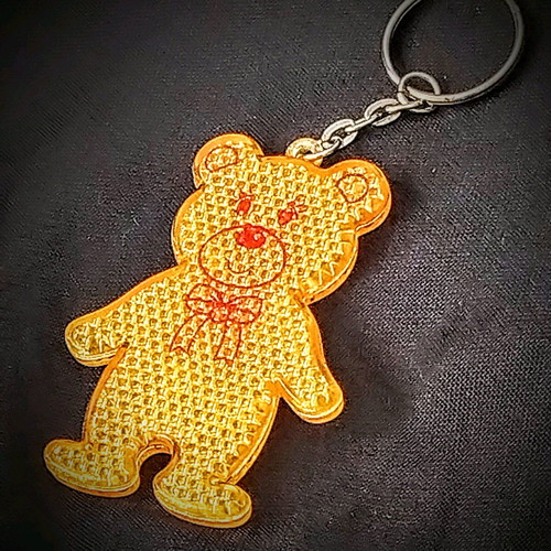 Reflective keychain Bear like new, yellow and orange