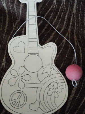 Wooden children's guitar with painting ball like new