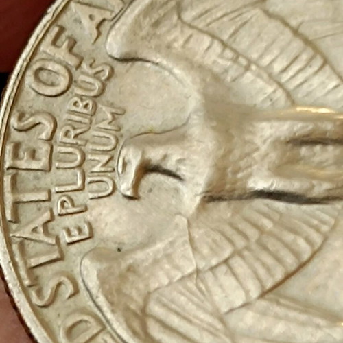 US quarter dollar 1965 used with mint error die break