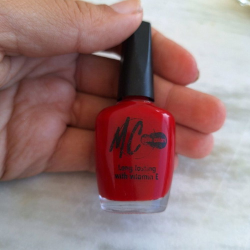 Manoli MC red nail polish like new