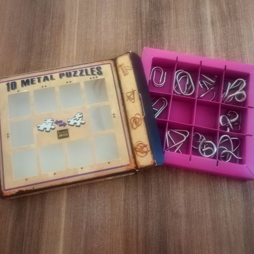 Metal puzzle set of 10 purple pieces like new, for kids 7+
