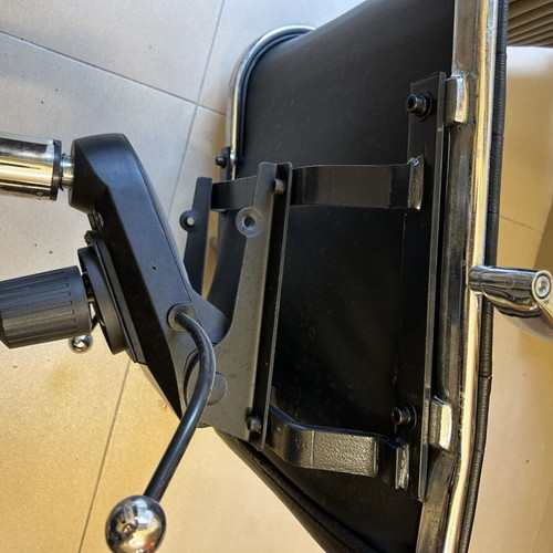 Neoset executive office chair used with ribbed black leather and chrome frame
