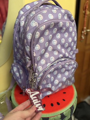 Purple Smiley Backpack, spacious with multiple compartments