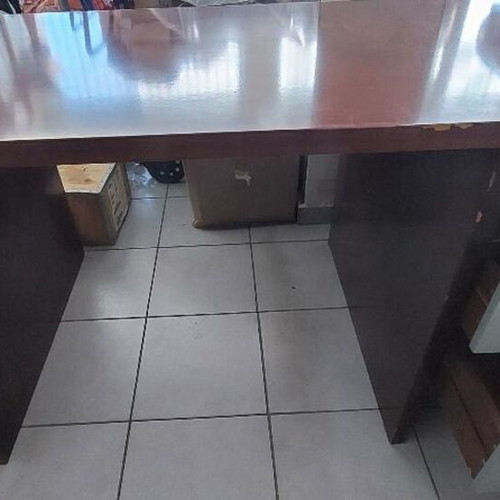 Desk used, large rosewood construction with storage and glass top