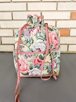 Vintage fabric drawstring bag with floral pattern