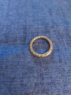 Women's ring used, hammered silver band