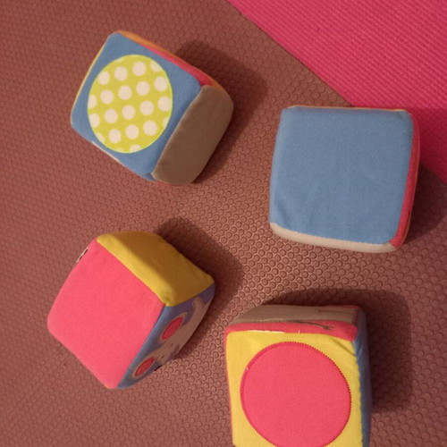 Soft plush blocks used, 4 plush cubes with designs