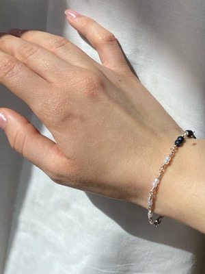 Handmade bracelet with pearls, charm and blue tiger beads made to order