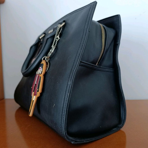 Love Moschino black hand bag like new with charms