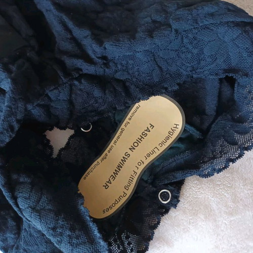 Black lace bodysuit new, elastic fit M/L