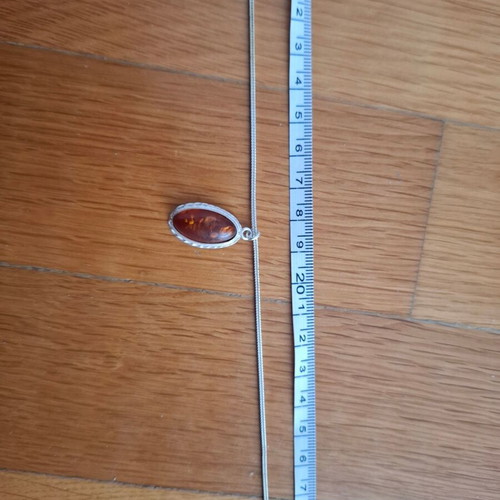 Women's oval pendant with amber and silver chain like new