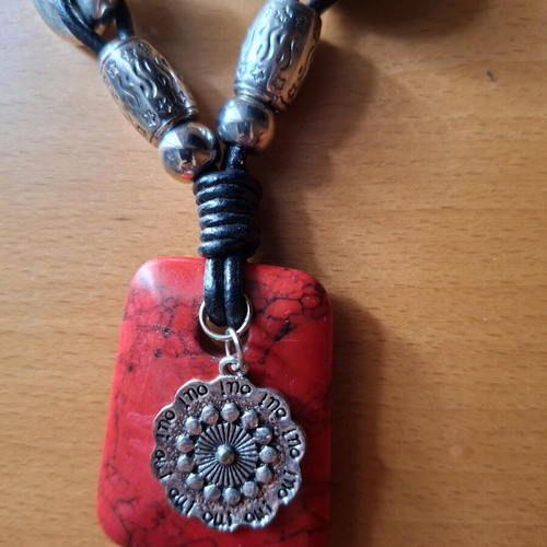 Women's necklace with red stone pendant and silver accessories like new