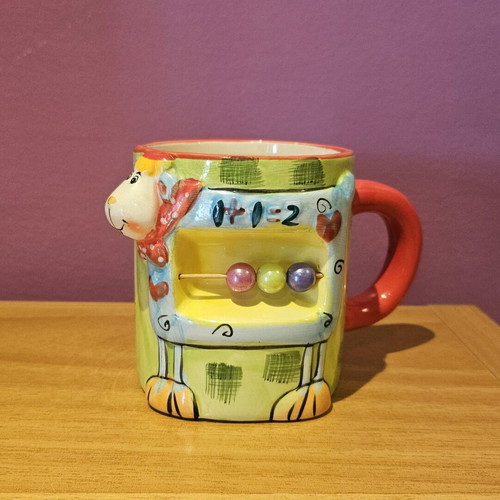 Children's mug used with lamb and abacus design