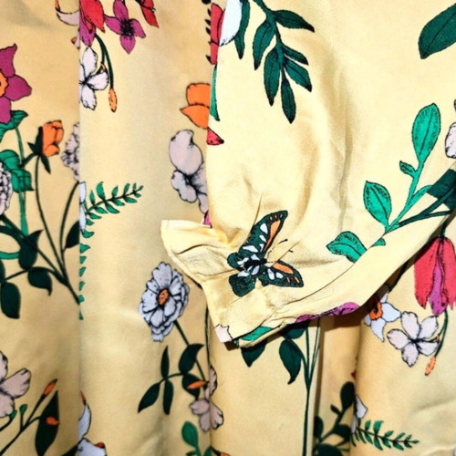 Floral dress with long sleeves, high neck and back opening like new