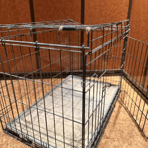 Metal Pet Crate used, durable for medium-sized dogs