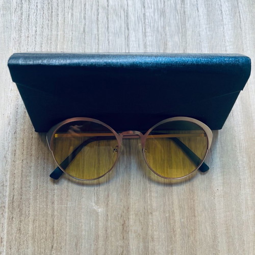 Hawkers sunglasses used, transparent with yellow tint