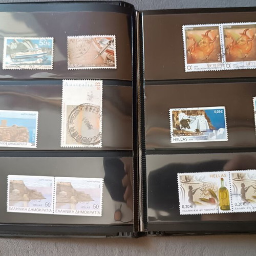 Stamp album with 120 stamps like new, Greece Australia Cyprus Germany America Canada