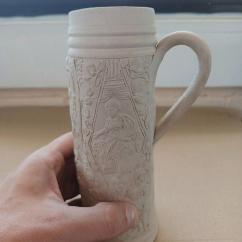 Die Schnelle carved beer mug like new, embossed clay