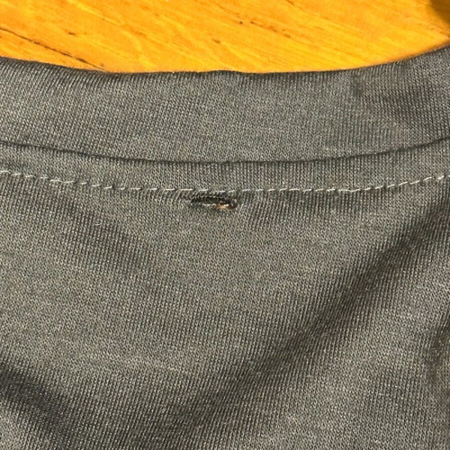 Crop top used gray with small hole at back, sizes S and M