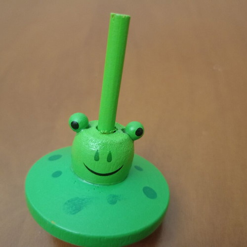 Wooden spinning top "Frog" like new, green traditional toy