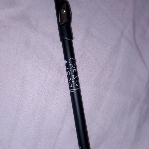 Green eye pencil Dust and cream like new