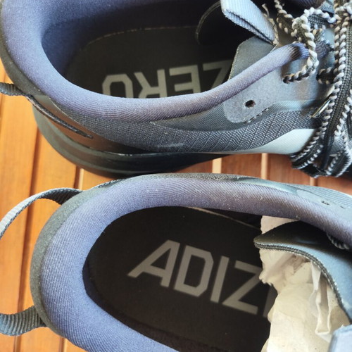 Adidas Evo SL ATR running shoes size 43.5, water-repellent, black with silver stripes