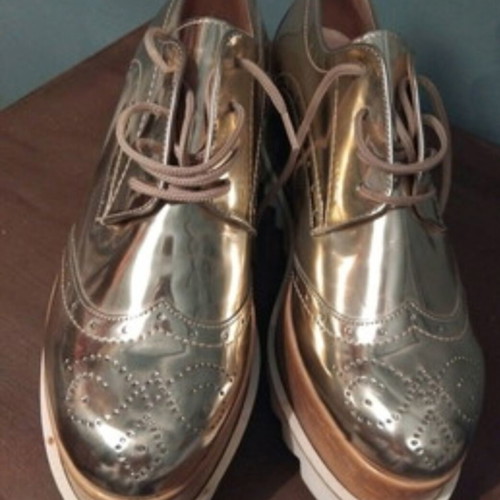 Oxford women's shoes like new with high double platform and brogue design