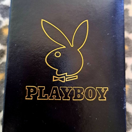 Playboy collectible playing cards with leather case like new
